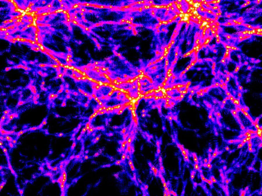 A simulation of dark matter's influence on galaxy formation, showing filaments of dark matter connecting visible galaxies