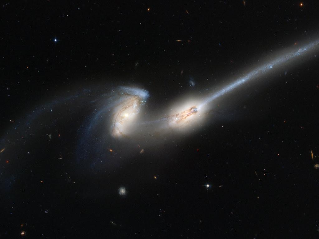 A computer simulation of two spiral galaxies in the process of merging