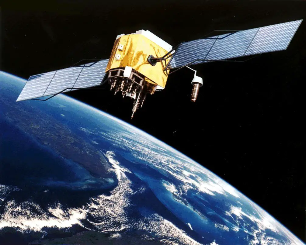 A GOES satellite orbiting Earth, with its instruments for monitoring space weather.