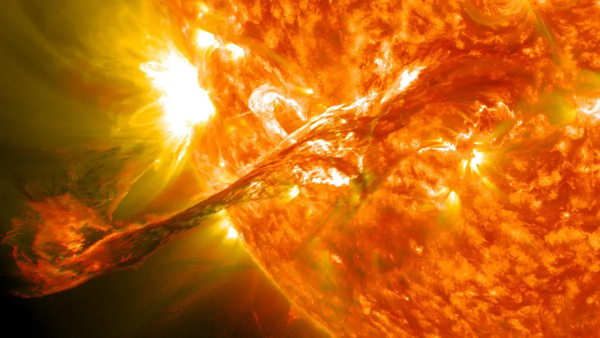 Massive solar flare erupting from the sun's surface into space