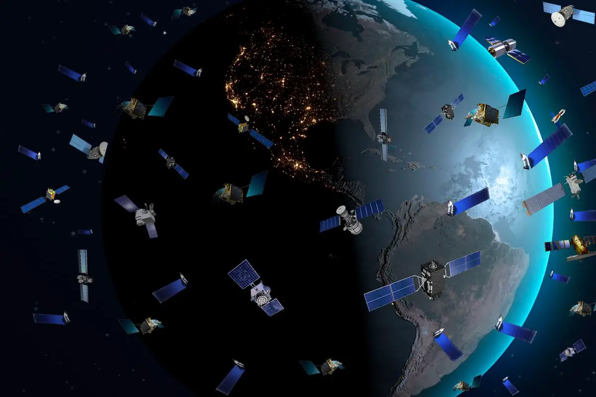 A visualization of the Starlink satellite constellation in Earth's orbit, with multiple satellites visible against the backdrop of the planet